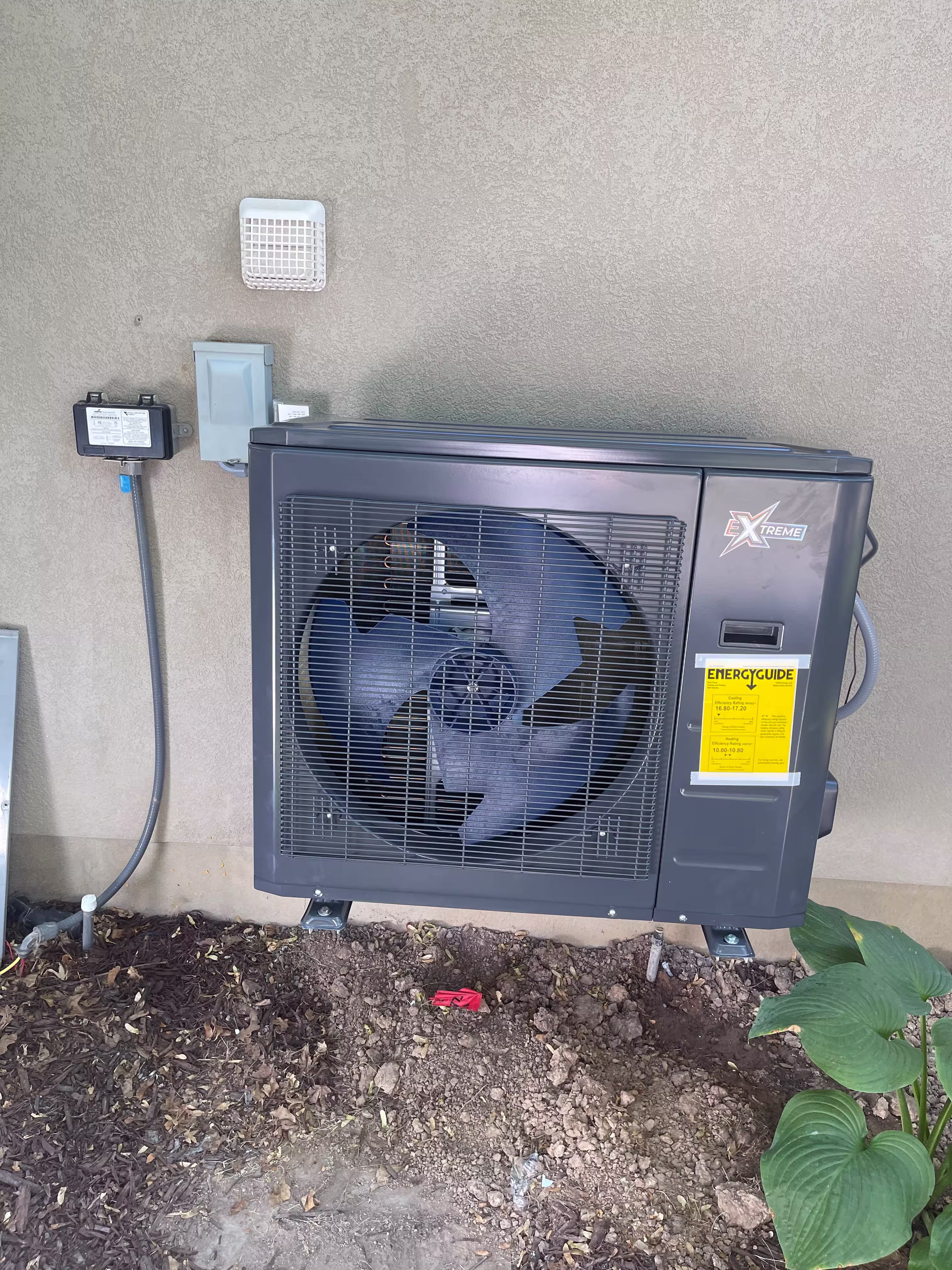 Installed Layton dual fuel inverter heat pump outdoor unit
